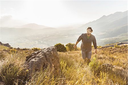 franschhoek - Man enjoying sunny day, Franschhoek, South Africa Foto de stock - Sin royalties Premium, Código: 649-08661057