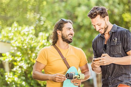 simsearch:649-09036191,k - Young male skateboarder and friend in park, Franschhoek, South Africa Stock Photo - Premium Royalty-Free, Code: 649-08661554