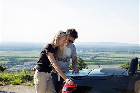 simsearch:700-00350275,k - Mature couple looking at map on car boot Stock Photo - Premium Royalty-Free, Code: 649-08662172