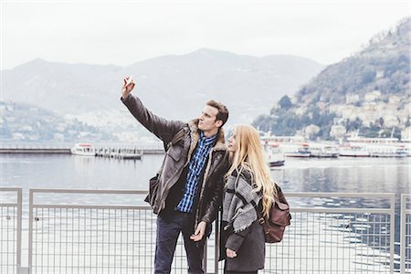 simsearch:649-08702811,k - Young couple on lakeside taking smartphone selfie, Lake Como, Italy Stock Photo - Premium Royalty-Free, Code: 649-08702791