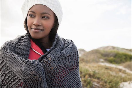 simsearch:649-08702973,k - Young woman wrapped in knitted shawl on cold day Photographie de stock - Premium Libres de Droits, Code: 649-08702965