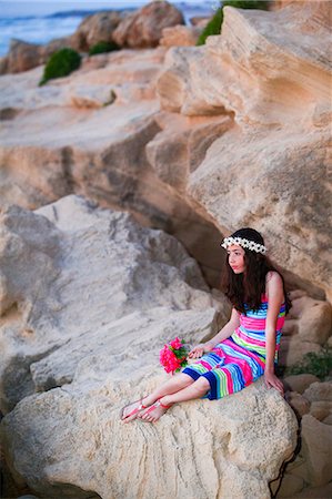 Girl resting on rocks Stock Photo - Premium Royalty-Free, Code: 649-08702976