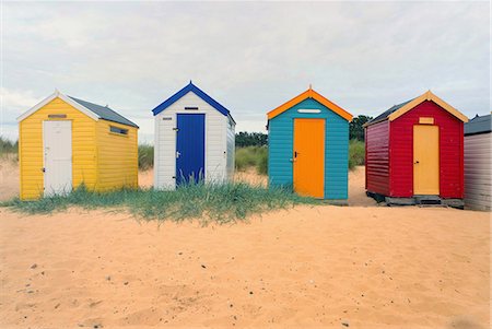 simsearch:614-06442547,k - Front view of a row four multi-coloured beach huts, Southwold, Suffolk, UK Stock Photo - Premium Royalty-Free, Code: 649-08703362