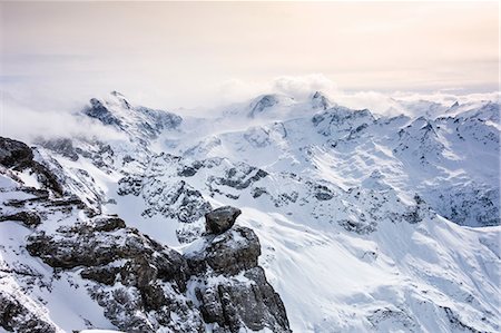 simsearch:649-08328454,k - Snow covered landscape and low cloud, Mount Titlis, Switzerland Stock Photo - Premium Royalty-Free, Code: 649-08714315