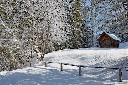 simsearch:6122-07704263,k - Log cabin by trees on snow covered landscape, Elmau, Bavaria, Germany Stock Photo - Premium Royalty-Free, Code: 649-08714525