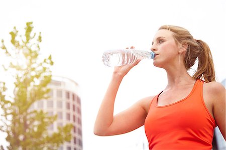 simsearch:649-09025831,k - Woman drinking from water bottle Stock Photo - Premium Royalty-Free, Code: 649-08714888