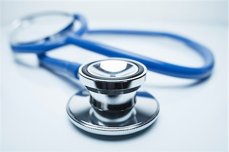stethoscope - Acoustic stethoscope on white background Stock Photo - Premium Royalty-Free, Code: 649-08745244
