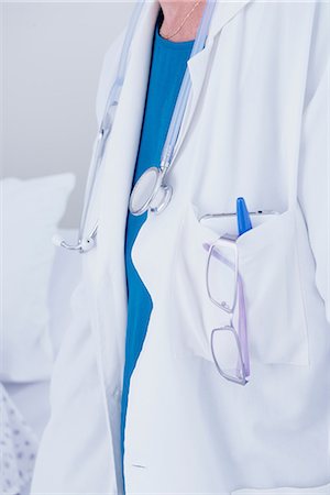 simsearch:649-08745361,k - Cropped shot of female doctor wearing white coat and stethoscope Stock Photo - Premium Royalty-Free, Code: 649-08745377