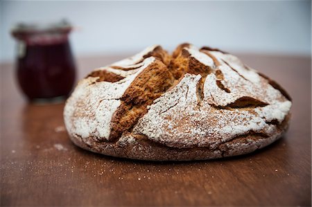 rye - Rye bread (Roggenbrot) and jam on wooden table Stock Photo - Premium Royalty-Free, Code: 649-08745570