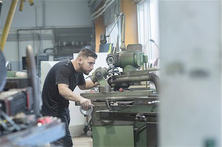 Man working in grinding workshop Stock Photo - Premium Royalty-Free, Code: 649-08766121