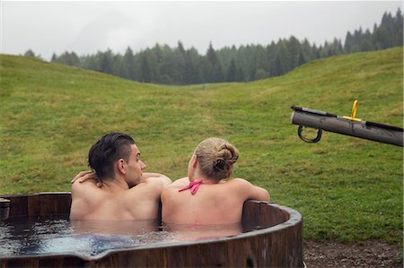 simsearch:649-08824522,k - Rear view of young couple relaxing in rural hot tub, Sattelbergalm, Tyrol, Austria Stock Photo - Premium Royalty-Free, Code: 649-08824513