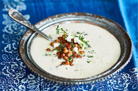 rustic food meal table - Bowl of cauliflower soup garnished with chickpeas Stock Photo - Premium Royalty-Free, Code: 649-08825134