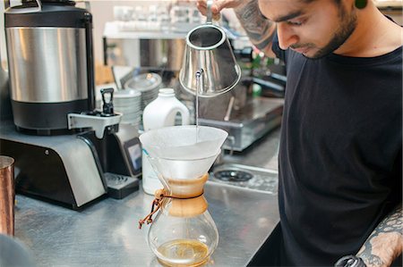 simsearch:649-08661617,k - Male barista preparing filter coffee in cafe Stockbilder - Premium RF Lizenzfrei, Bildnummer: 649-08840257