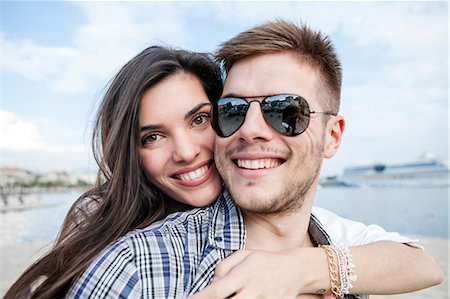 simsearch:649-08840317,k - Close up portrait of  couple hugging on harbour, Split, Dalmatia, Croatia Photographie de stock - Premium Libres de Droits, Code: 649-08840306