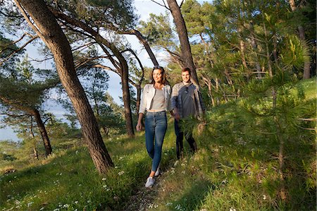 simsearch:649-08840317,k - Young couple strolling in coastal forest, Split, Dalmatia, Croatia Photographie de stock - Premium Libres de Droits, Code: 649-08840314
