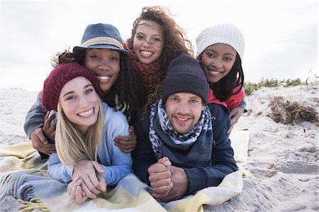 simsearch:851-02962541,k - Portrait of young adult friends lying on top of each other on beach, Western Cape, South Africa Foto de stock - Sin royalties Premium, Código: 649-08840668