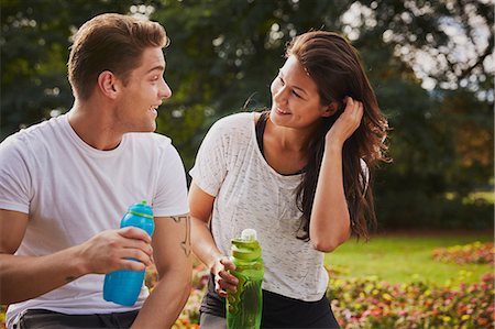 simsearch:649-08577606,k - Man and woman training in park, chatting during a water break Stock Photo - Premium Royalty-Free, Code: 649-08840691