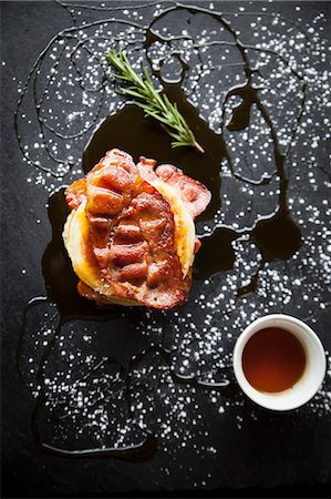 fresh rosemary - Overhead view of breakfast bacon crumpet with maple syrup on slate Stock Photo - Premium Royalty-Free, Code: 649-08859795