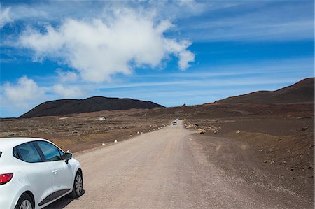 simsearch:614-09213877,k - Volcanic landscape with car parked at roadside, Reunion National Park, Reunion Island Fotografie stock - Premium Royalty-Free, Codice: 649-08860396