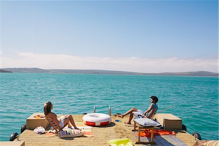 simsearch:649-08894469,k - Couple relaxing on houseboat sun deck, Kraalbaai, South Africa Fotografie stock - Premium Royalty-Free, Codice: 649-08894479