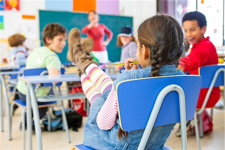 simsearch:649-07710434,k - Rear view of primary schoolgirl with feet on desk in classroom Stockbilder - Premium RF Lizenzfrei, Bildnummer: 649-08895129