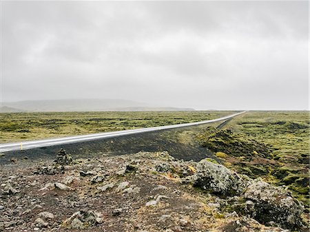 dyrholaey - Flat landscape and rural road, Dyrholaey, Iceland Stock Photo - Premium Royalty-Free, Code: 649-08895140