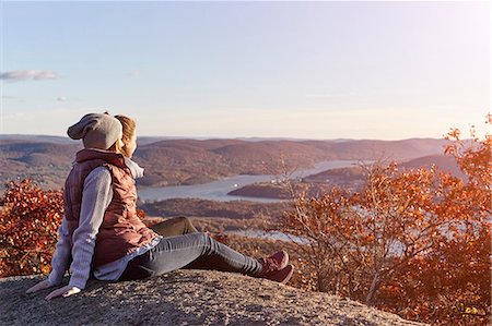 simsearch:649-08900813,k - Two young women looking out over lake and hills, New York State, USA Stock Photo - Premium Royalty-Free, Code: 649-08900710
