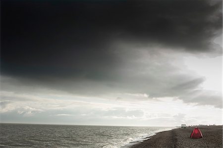 dramatic storm - Tent pitched on beach beside sea, Aldeburgh, Suffolk, England Stock Photo - Premium Royalty-Free, Code: 649-08901742