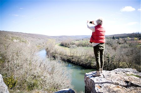 simsearch:614-08720980,k - Woman hiker photographing elevated view, Bruniquel, France Stock Photo - Premium Royalty-Free, Code: 649-08923320