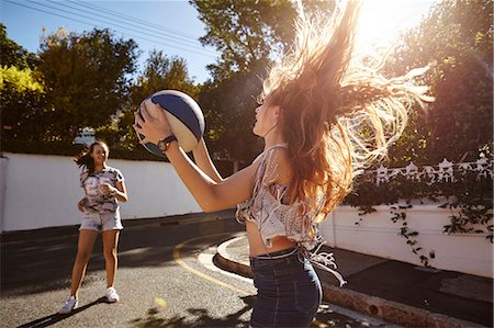 preteen friends not adults - Teenage girls playing with ball in street, Cape Town, South Africa Stock Photo - Premium Royalty-Free, Code: 649-08923553