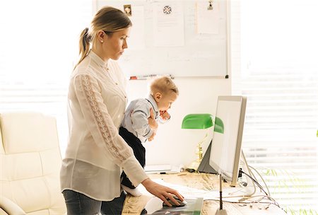 family adult children busy - Mother working and caring for baby at home Stock Photo - Premium Royalty-Free, Code: 649-08923601