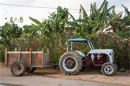 Tractor and trailer parked on roadside, Vinales, Cuba Stock Photo - Premium Royalty-Free, Code: 649-08923875