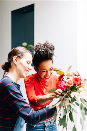 simsearch:649-09269245,k - Florist and student arranging bouquet at flower arranging workshop Stock Photo - Premium Royalty-Free, Code: 649-08923971