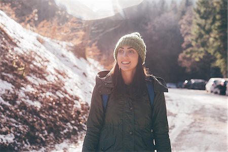 Female hiker hiking along forest road, Monte San Primo, Italy Fotografie stock - Premium Royalty-Free, Codice: 649-08949530