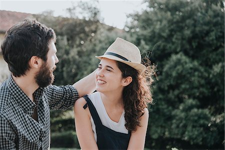 simsearch:649-08949872,k - Man trying trilby hat on girlfriend, Arezzo, Tuscany, Italy Stock Photo - Premium Royalty-Free, Code: 649-08949882