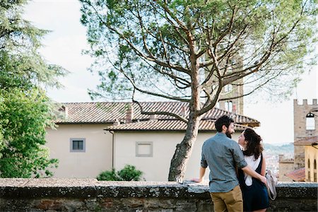 simsearch:649-08949872,k - Rear view of couple gazing at each other, Arezzo, Tuscany, Italy Stock Photo - Premium Royalty-Free, Code: 649-08949883