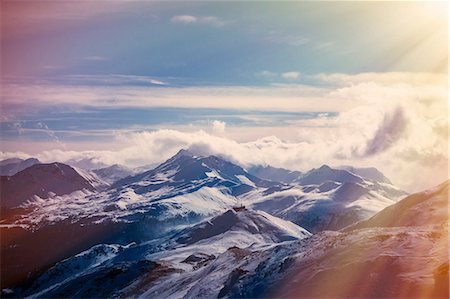 simsearch:649-08632479,k - Clouds on snow capped mountain peaks, Lenzerheide, Swiss Alps, Switzerland Photographie de stock - Premium Libres de Droits, Code: 649-08950059