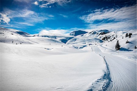 simsearch:649-08714528,k - Ski slope on snow covered landscape, Arosa, Swiss Alps, Switzerland Stock Photo - Premium Royalty-Free, Code: 649-08950063