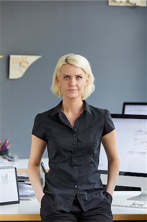 simsearch:649-08950791,k - Portrait of confident female designer at office desk Stock Photo - Premium Royalty-Free, Code: 649-08950806