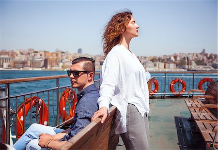 simsearch:649-08479829,k - Young tourist couple on passenger ferry deck, Beyazit, Turkey Foto de stock - Royalty Free Premium, Número: 649-08951080