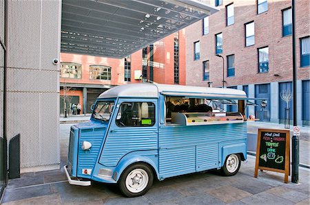 food stall - Vintage pizza van parked outside office buildings Stock Photo - Premium Royalty-Free, Code: 649-08968770