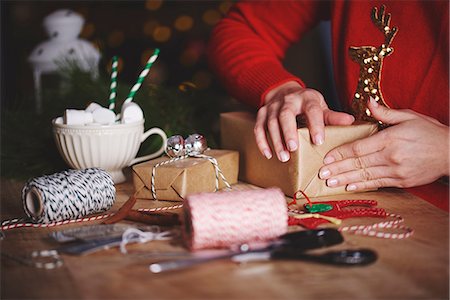 simsearch:649-08969025,k - Woman wrapping christmas gift Stock Photo - Premium Royalty-Free, Code: 649-08969044