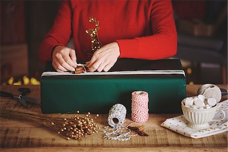 simsearch:649-08969054,k - Woman wrapping christmas gift Stock Photo - Premium Royalty-Free, Code: 649-08969041