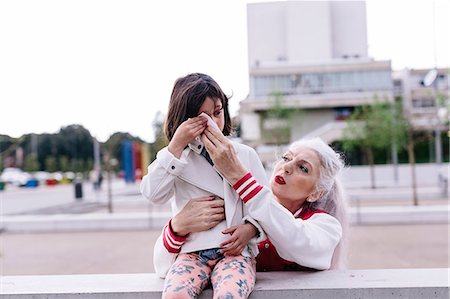 simsearch:649-08060348,k - Mature woman wiping girl's tears in city Stock Photo - Premium Royalty-Free, Code: 649-08969137