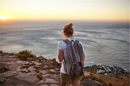 simsearch:614-08990349,k - Young woman hiking, rear view, Lions head Mountain, Western Cape, Cape Town, South Africa Stock Photo - Premium Royalty-Free, Code: 649-08969759