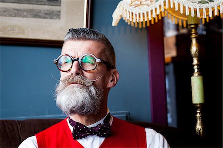 simsearch:6116-08915920,k - Portrait of stylish quirky senior man vintage cafe Stock Photo - Premium Royalty-Free, Code: 649-08987797