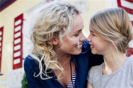simsearch:649-08118903,k - Mother and daughter enjoying being together outdoors Stock Photo - Premium Royalty-Free, Code: 649-08988400