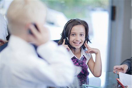 Children playing business people at desk Stock Photo - Premium Royalty-Free, Code: 649-09004112