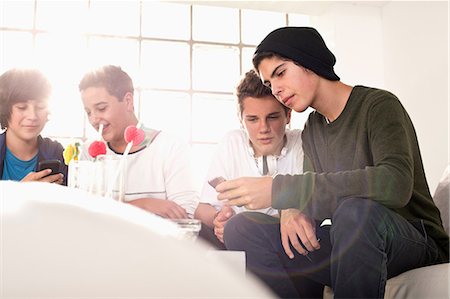 simsearch:649-06844687,k - Teenage boys at house party Stock Photo - Premium Royalty-Free, Code: 649-09004336