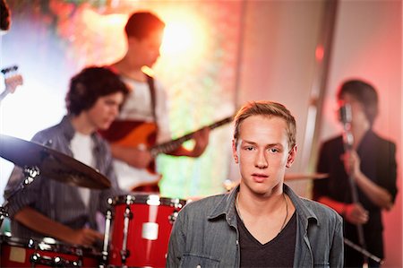simsearch:640-01365454,k - Teenage boy with band in background Stock Photo - Premium Royalty-Free, Code: 649-09004360